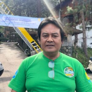 Maman Suparman Menjelajahi Separuh Indonesia dengan Sepeda Motor Listrik